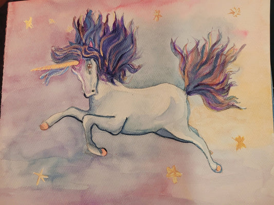 Draíocht Painting by Daonna Designs depicts a unicorn mid leap portrayed in colourful watercolour with a flowing rainbow mane and tail and golden stars dotted around a backgrund of pinks and purples
